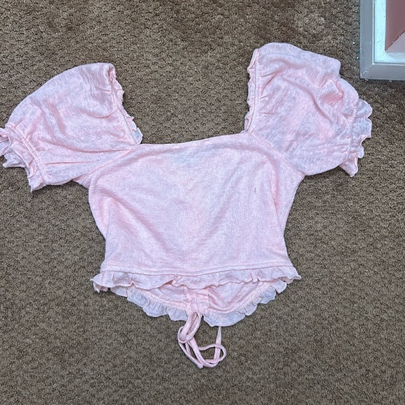 Adorable pink blouse goes well with jeans and skirts size small, worth the buy. - Picture 2 of 2